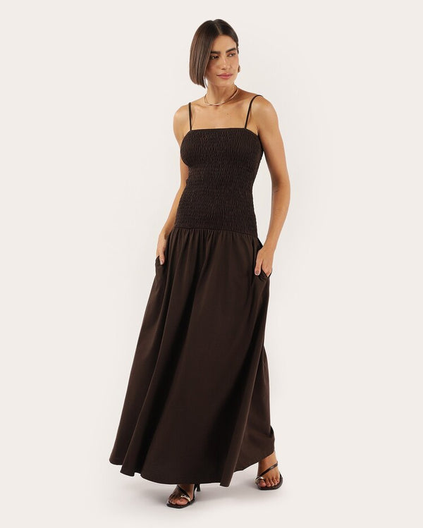 Long flared dress with stretch and thin brown straps
